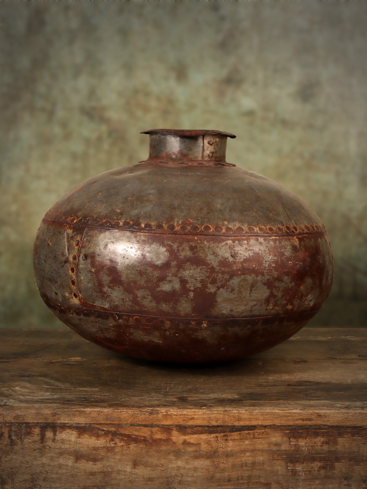 Aged Metal Vessel